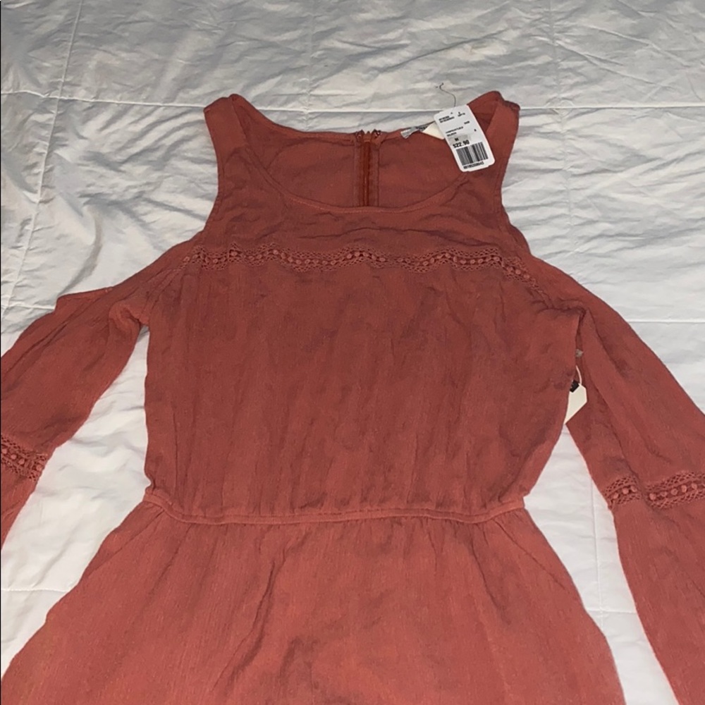 Long sleeve shoulder cut out jumpsuit